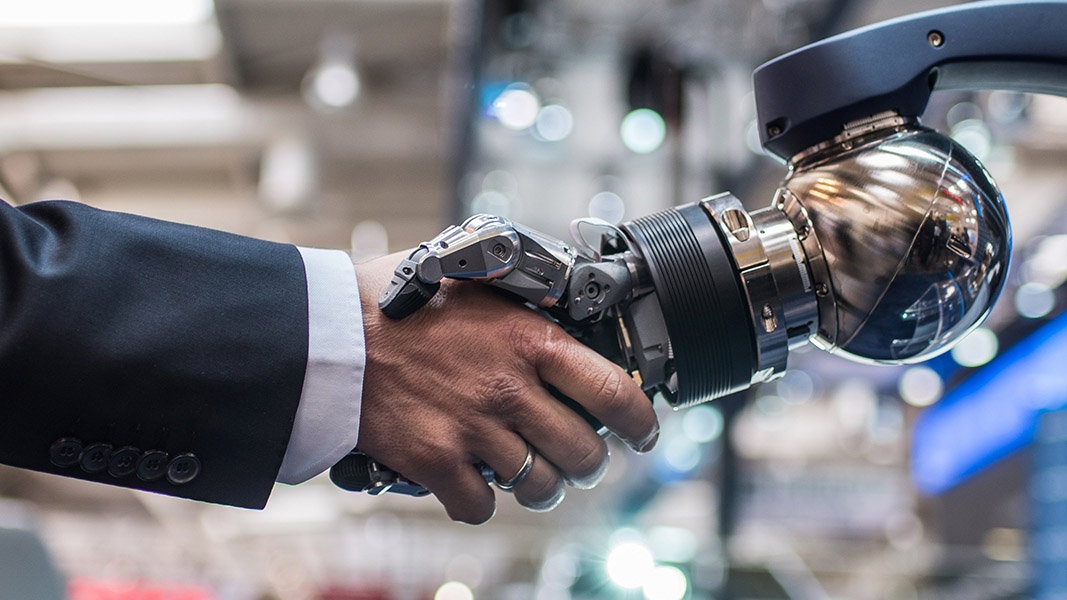 In coming future, human beings will shake their hands with Robots.